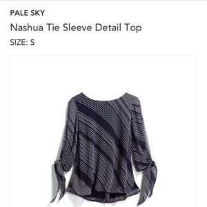 Pale sky open sleeve top with button detail down back